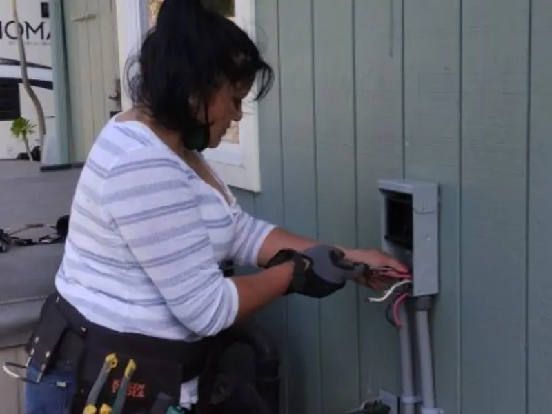 Licensed electrician wiring an exterior subpanel in Canal Winchester